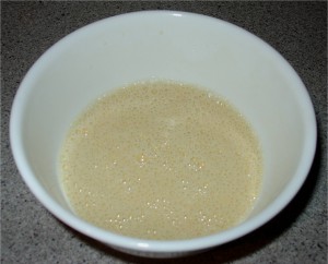 Whisk Eggs Yolks with Milk