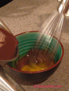 Whisk Chocolate into Egg Yolks